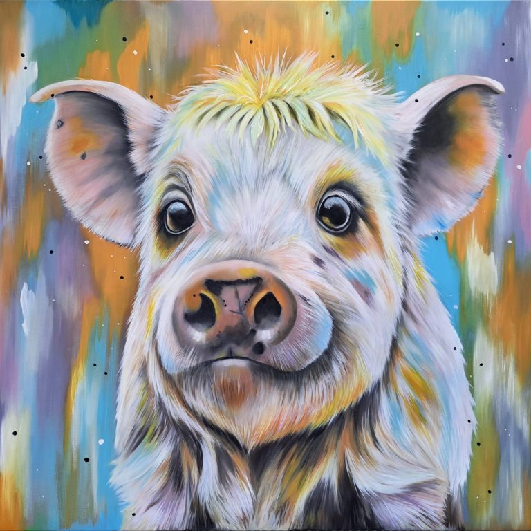 A cheerful patchwork pig portrait with a friendly expression, displayed above a sofa.