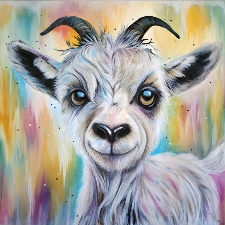 A smiling lamb portrait against a colourful, blurred background.